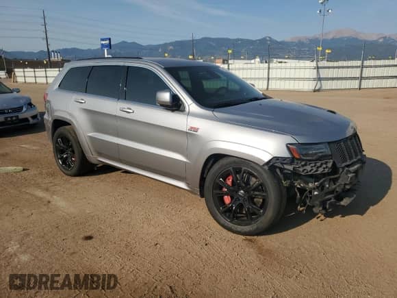 2014 Jeep Grand Cherokee SRT-8 z VIN 1C4RJFDJ6EC191973, wystawiony jako Copart lot #69803205 z przebiegiem 82 537 mil mil oraz Szkoda całkowita • Salvage title. Historia ofert i sprzedaży dostępna na DreamBid. Obrazek 4.