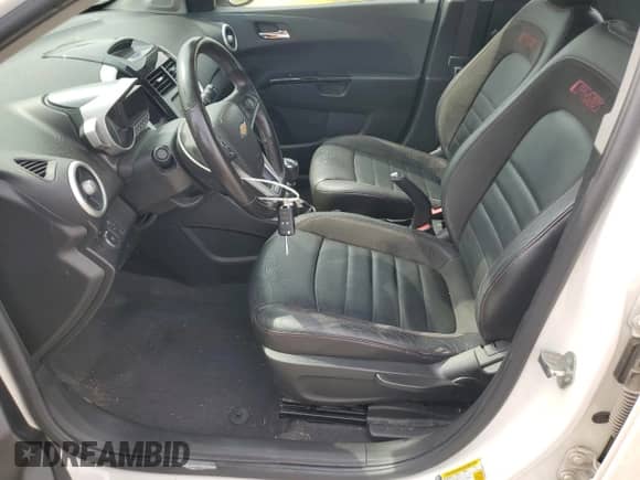 2015 Chevrolet Sonic RS with VIN 1G1JH6SB1F4154063, listed as a Copart auction lot 81189525 with 136,030 mi miles and Salvage title. Bid and sale history available at DreamBid. Image 7.