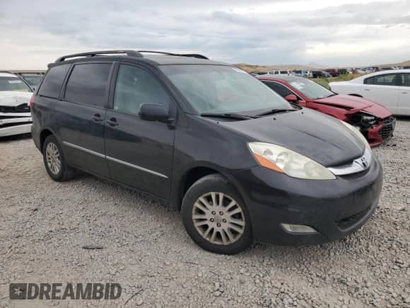 2008 Toyota Sienna XLE z VIN 5TDBK22C38S013128, wystawiony jako Copart lot #70060255 z przebiegiem 154 984 mil mil oraz Czysty tytuł • Clean title. Historia ofert i sprzedaży dostępna na DreamBid. Obrazek 4.