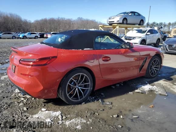 2021 BMW Z4 sDrive30i with VIN WBAHF3C05MWX36897, listed as a Copart auction lot 42633724 with 21,141 mi miles and . Bid and sale history available at DreamBid. Image 3.