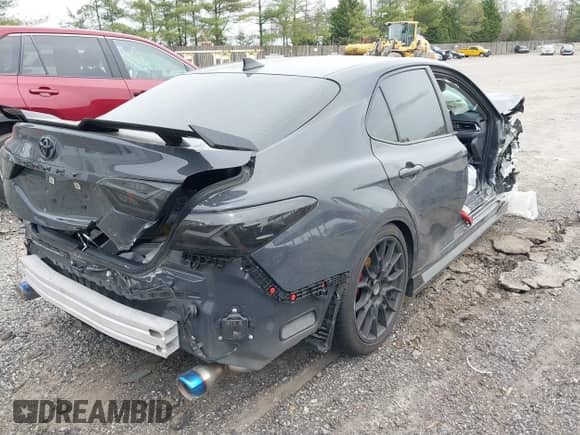 2024 Toyota Camry TRD with VIN 4T1KZ1AK6RU092771, listed as a IAAI auction lot 39123624 with 9,888 mi miles and . Bid and sale history available at DreamBid. Image 4.