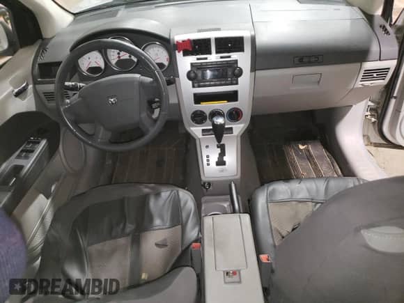 2007 Dodge Caliber R/T with VIN 1B3HE78K67D409143, listed as a Copart auction lot 71726345 with 135,238 mi miles and Salvage title. Bid and sale history available at DreamBid. Image 8.