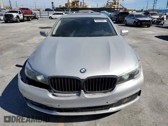 2018 BMW 7 Series 740i с VIN WBA7E2C56JG742086, выставлен на аукционе Copart как лот 69280085 с пробегом 69 457 миль миль и Списание • Salvage title. История ставок и продаж доступна на DreamBid. Изображение 5.