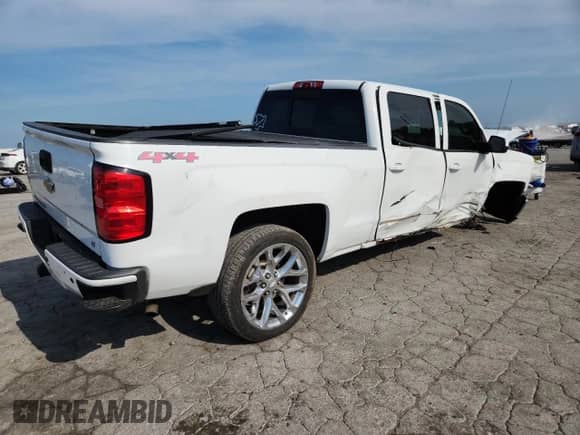 2015 Chevrolet Silverado 1500 LT with VIN 3GCUKREC0FG220410, listed as a Copart auction lot 66622305 with 132,002 mi miles and Salvage title. Bid and sale history available at DreamBid. Image 3.