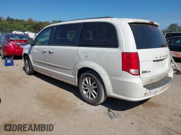 2014 Dodge Grand Caravan SXT with VIN 2C4RDGCG4ER356980, listed as a IAAI auction lot 43422340 with 220,103 mi miles and . Bid and sale history available at DreamBid. Image 3.