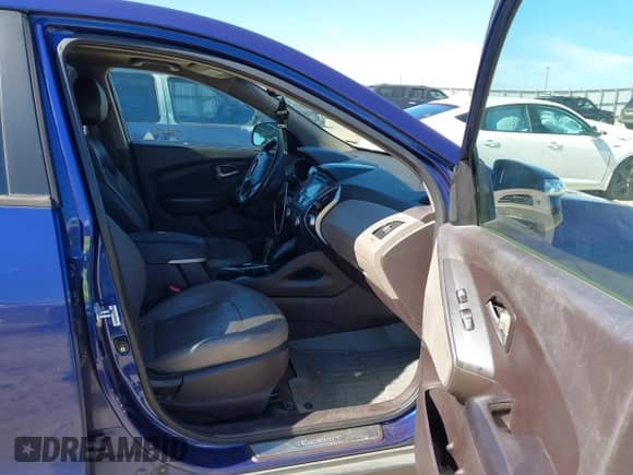 2012 Hyundai Tucson GLS with VIN KM8JU3AC9CU530253, listed as a IAAI auction lot 41677093 with 203,025 mi miles and . Bid and sale history available at DreamBid. Image 5.