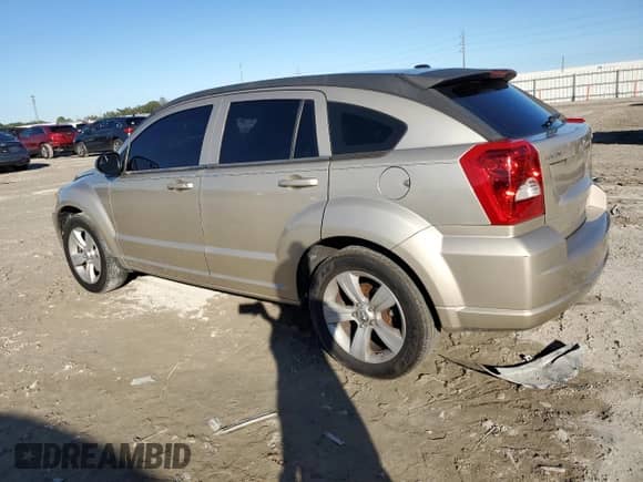 2010 Dodge Caliber Uptown z VIN 1B3CB9HB8AD611181, wystawiony jako Copart lot #86784104 z przebiegiem 119 103 mil mil oraz Szkoda całkowita • Salvage title. Historia ofert i sprzedaży dostępna na DreamBid. Obrazek 2.