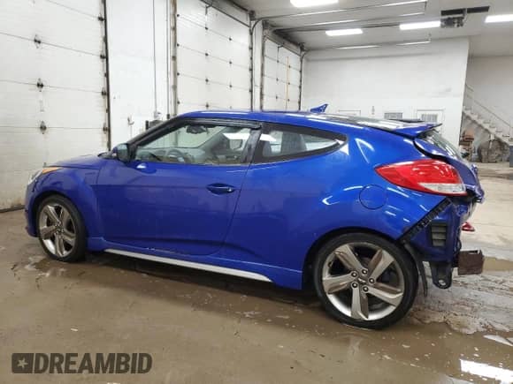2013 Hyundai Veloster Turbo с VIN KMHTC6AE1DU120157, выставлен на аукционе Copart как лот 64289055 с пробегом 144 651 миль миль и Чистый • Clean title. История ставок и продаж доступна на DreamBid. Изображение 2.