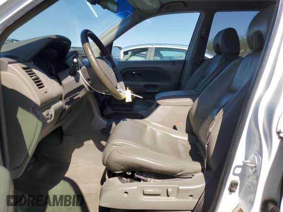 2006 Honda Pilot EX-L с VIN 2HKYF18516H550651, выставлен на аукционе Copart как лот 71197085 с пробегом 177 120 миль миль и Списание • Salvage title. История ставок и продаж доступна на DreamBid. Изображение 7.