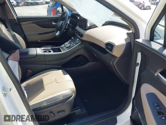 2023 Hyundai Santa Fe Limited with VIN 5NMS44AL0PH633816, listed as a IAAI auction lot 43324554 with 31,271 mi miles and . Bid and sale history available at DreamBid. Image 5.