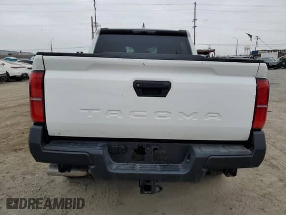 2024 Toyota Tacoma SR с VIN 3TYKD5HN9RT002032, выставлен на аукционе Copart как лот 53355655 с пробегом 6 144 миль миль и Списание • Salvage title. История ставок и продаж доступна на DreamBid. Изображение 6.