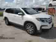 2021 Honda Pilot EX-L with VIN 5FNYF5H54MB026039, listed as a Copart auction lot 71796535 with 66,339 mi miles and Salvage title. Bid and sale history available at DreamBid. Image 4.