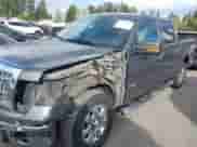 2013 Ford F-150 XL with VIN 1FTFW1CT9DKD08993, listed as a IAAI auction lot 43455467 with 207,161 mi miles and . Bid and sale history available at DreamBid. Image 2.