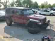 2021 Jeep Wrangler Unlimited Rubicon with VIN 1C4HJXFG9MW580235, listed as a Copart auction lot 59118385 with Not provided miles and Salvage title. Bid and sale history available at DreamBid. Image 4.