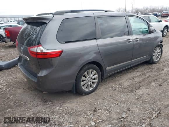 2015 Toyota Sienna Limited with VIN 5TDDK3DCXFS100341, listed as a IAAI auction lot 41245558 with 114,854 mi miles and . Bid and sale history available at DreamBid. Image 4.