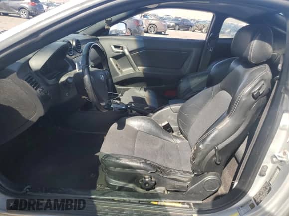 2008 Hyundai Tiburon GT with VIN KMHHN66F88U293438, listed as a Copart auction lot 76065164 with 157,547 mi miles and Salvage title. Bid and sale history available at DreamBid. Image 7.