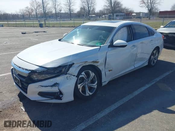 2018 Honda Accord EX-L with VIN 1HGCV2F51JA040193, listed as a IAAI auction lot 41837004 with 69,779 mi miles and . Bid and sale history available at DreamBid. Image 2.