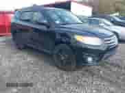 2012 Hyundai Santa Fe SE z VIN 5XYZH4AG5CG096869, wystawiony jako IAAI lot #43278076 z przebiegiem 185 721 mil mil oraz . Historia ofert i sprzedaży dostępna na DreamBid. Obrazek 1.