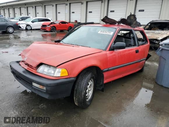 1990 Honda Civic with VIN 2HGED6341LH558159, listed as a Copart auction lot 84926234 with 1,554,163 mi miles and Salvage title. Bid and sale history available at DreamBid. Image 1.