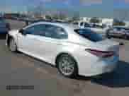 2020 Toyota Camry Hybrid XLE with VIN 4T1F31AK4LU523702, listed as a IAAI auction lot 42734831 with 144,778 mi miles and . Bid and sale history available at DreamBid. Image 3.