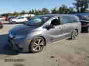 2018 Honda Odyssey Elite with VIN 5FNRL6H98JB061104, listed as a Copart auction lot 71596155 with 120,813 mi miles and Salvage title. Bid and sale history available at DreamBid. Image 1.