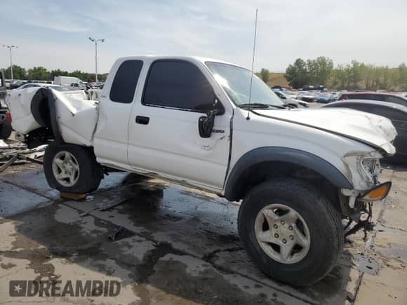 2001 Toyota Tacoma с VIN 5TEWN72N71Z837553, выставлен на аукционе Copart как лот 68886775 с пробегом 256 531 миль миль и Списание • Salvage title. История ставок и продаж доступна на DreamBid. Изображение 4.
