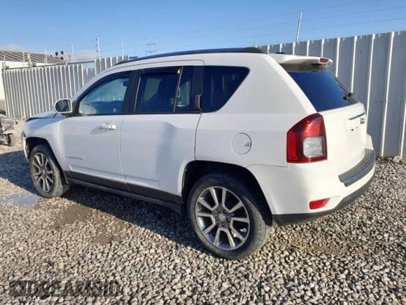 2017 Jeep Compass Latitude with VIN 1C4NJCEA9HD130529, listed as a Copart auction lot 52049285 with 82,338 mi miles and Salvage title. Bid and sale history available at DreamBid. Image 2.