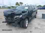 2023 Chevrolet Suburban LS z VIN 1GNSCBKD1PR283727, wystawiony jako IAAI lot #40763141 z przebiegiem 65 218 mil mil oraz . Historia ofert i sprzedaży dostępna na DreamBid. Obrazek 2.