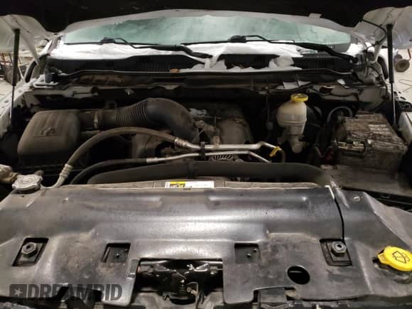 2018 Ram 1500 Lone Star z VIN 1C6RR7LT2JS145579, wystawiony jako Copart lot #82819134 z przebiegiem 115 621 mil mil oraz Szkoda całkowita • Salvage title. Historia ofert i sprzedaży dostępna na DreamBid. Obrazek 13.