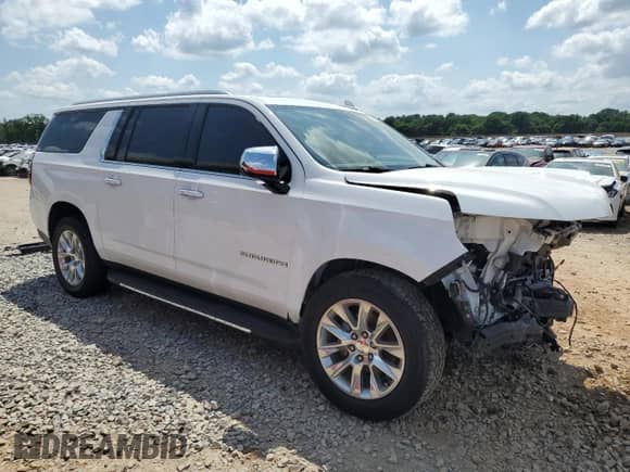 2021 Chevrolet Suburban Premier с VIN 1GNSCFKD4MR299990, выставлен на аукционе Copart как лот 54847005 с пробегом 93 384 миль миль и Списание • Salvage title. История ставок и продаж доступна на DreamBid. Изображение 4.
