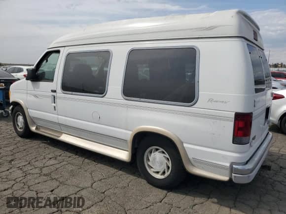 2003 Ford Econoline Cargo Recreational with VIN 1FDRE14L63HA06440, listed as a Copart auction lot 80953915 with 128,565 mi miles and Clean title. Bid and sale history available at DreamBid. Image 2.