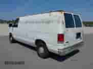 1999 Ford Econoline Cargo with VIN 1FTRE1428XHA20390, listed as a IAAI auction lot 41806875 with 207,954 mi miles and . Bid and sale history available at DreamBid. Image 3.