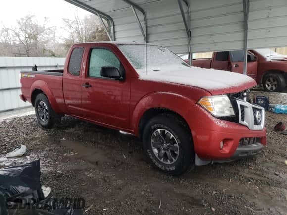 2014 Nissan Frontier SV with VIN 1N6AD0CU1EN747024, listed as a Copart auction lot 88105505 with 35,291 mi miles and Salvage title. Bid and sale history available at DreamBid. Image 4.