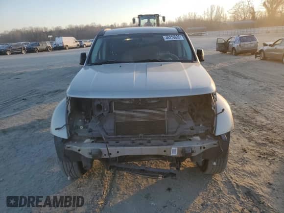 2010 Dodge Nitro SE with VIN 1D4PT2GK0AW104045, listed as a Copart auction lot 46216635 with 170,533 mi miles and Salvage title. Bid and sale history available at DreamBid. Image 5.