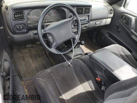 2000 Dodge Dakota с VIN 1B7FL26X1YS753294, выставлен на аукционе Copart как лот 64277635 с пробегом Не указан миль и Чистый • Clean title. История ставок и продаж доступна на DreamBid. Изображение 8.