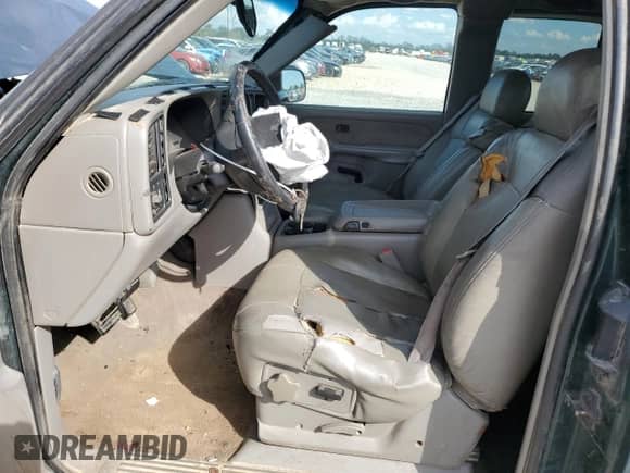 2002 Chevrolet Silverado 1500 LS with VIN 2GCEK19T621320904, listed as a Copart auction lot 84950455 with 289,089 mi miles and Salvage title. Bid and sale history available at DreamBid. Image 7.