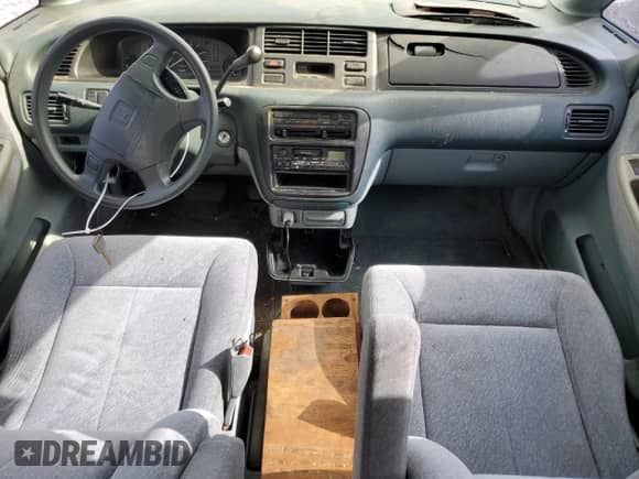 1997 Honda Odyssey with VIN JHMRA184XVC008354, listed as a Copart auction lot 44390495 with 246,841 mi miles and Salvage title. Bid and sale history available at DreamBid. Image 8.