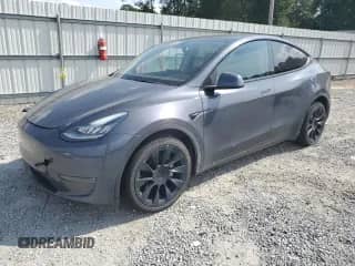 2022 Tesla Model Y Long Range с VIN 7SAYGDEE3NA006569, выставлен на аукционе Copart как лот 81778625 с пробегом 53 209 миль миль и Списание • Salvage title. История ставок и продаж доступна на DreamBid. Изображение 1.