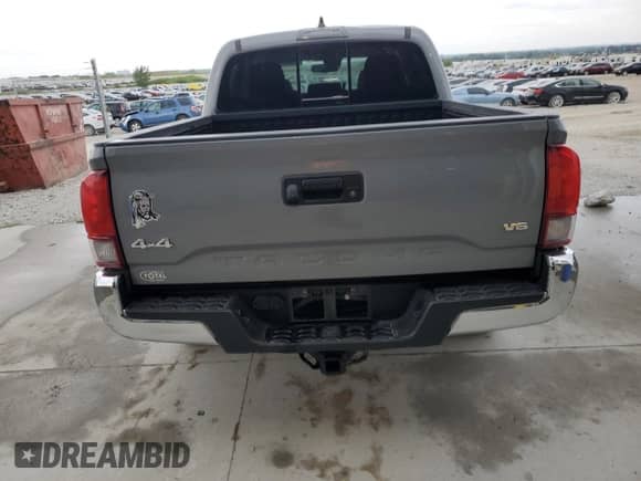 2021 Toyota Tacoma TRD Off Road with VIN 3TMCZ5AN5MM429356, listed as a Copart auction lot 71444135 with 68,728 mi miles and Salvage title. Bid and sale history available at DreamBid. Image 6.
