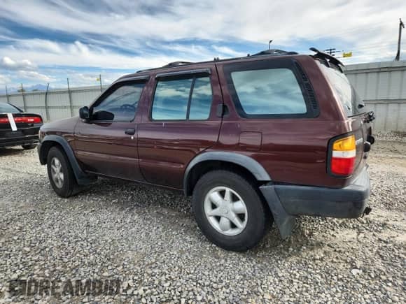 1997 Nissan Pathfinder XE z VIN JN8AR05Y4VW157712, wystawiony jako Copart lot #82383665 z przebiegiem 190 840 mil mil oraz Szkoda całkowita • Salvage title. Historia ofert i sprzedaży dostępna na DreamBid. Obrazek 2.