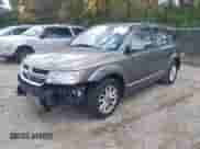 2013 Dodge Journey SXT with VIN 3C4PDCBB7DT502712, listed as a IAAI auction lot 43497552 with 157,495 mi miles and . Bid and sale history available at DreamBid. Image 2.