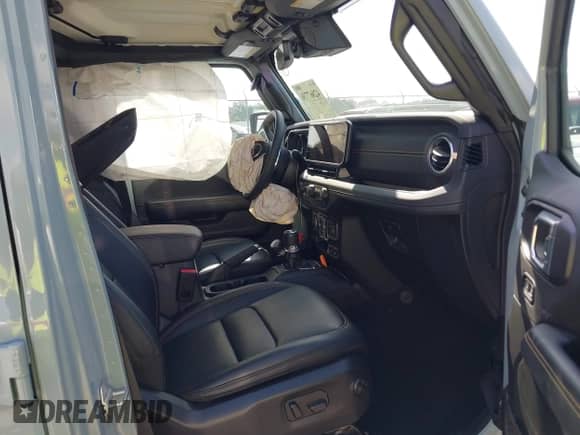 2024 Jeep Wrangler Sahara with VIN 1C4PJXEG6RW277739, listed as a IAAI auction lot 42867736 with 9,183 mi miles and . Bid and sale history available at DreamBid. Image 5.