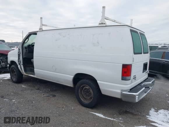 2013 Ford Econoline Cargo Commercial with VIN 1FTNE1EW1DDA21867, listed as a IAAI auction lot 41280581 with 186,166 mi miles and . Bid and sale history available at DreamBid. Image 3.