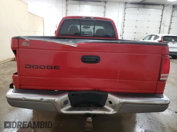 2003 Dodge Dakota с VIN 1D7HG42X23S296122, выставлен на аукционе Copart как лот 66366265 с пробегом 240 253 миль миль и Списание • Salvage title. История ставок и продаж доступна на DreamBid. Изображение 6.