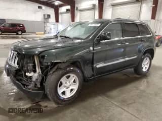 2011 Jeep Grand Cherokee 70th Anniversary with VIN 1J4RR4GT3BC736981, listed as a Copart auction lot 49171525 with 127,438 mi miles and Salvage title. Bid and sale history available at DreamBid. Image 1.