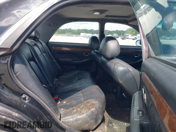 2005 Hyundai XG z VIN KMHFU45E55A423261, wystawiony jako IAAI lot #43083802 z przebiegiem 155 540 mil mil oraz . Historia ofert i sprzedaży dostępna na DreamBid. Obrazek 8.