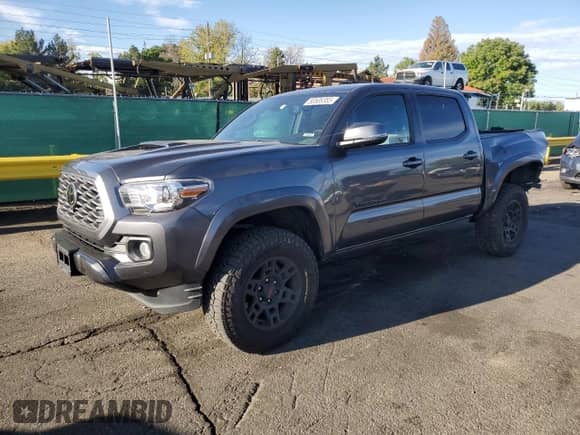 2023 Toyota Tacoma SR with VIN 3TMCZ5ANXPM559511, listed as a Copart auction lot 80508385 with 33,176 mi miles and Salvage title. Bid and sale history available at DreamBid. Image 1.