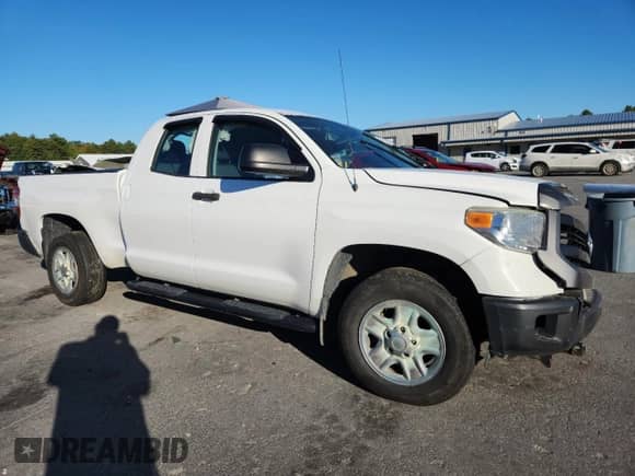 2014 Toyota Tundra SR с VIN 5TFUM5F19EX055757, выставлен на аукционе Copart как лот 81119465 с пробегом Не указан миль и Списание • Salvage title. История ставок и продаж доступна на DreamBid. Изображение 4.