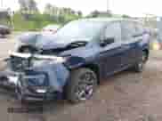 2022 Honda Passport EX-L with VIN 5FNYF8H52NB010909, listed as a IAAI auction lot 42439973 with 24,696 mi miles and . Bid and sale history available at DreamBid. Image 2.