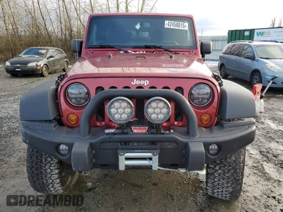 2013 Jeep Wrangler Rubicon with VIN 1C4HJWCG8DL520639, listed as a Copart auction lot 42458815 with 37,934 mi miles and Salvage title. Bid and sale history available at DreamBid. Image 5.